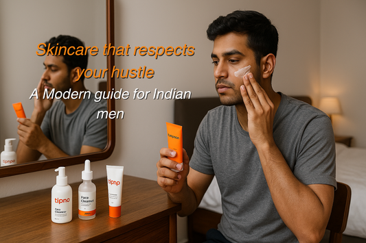 Indian man applying Tipnpo sunscreen with other skincare products on a dresser, mirror in background