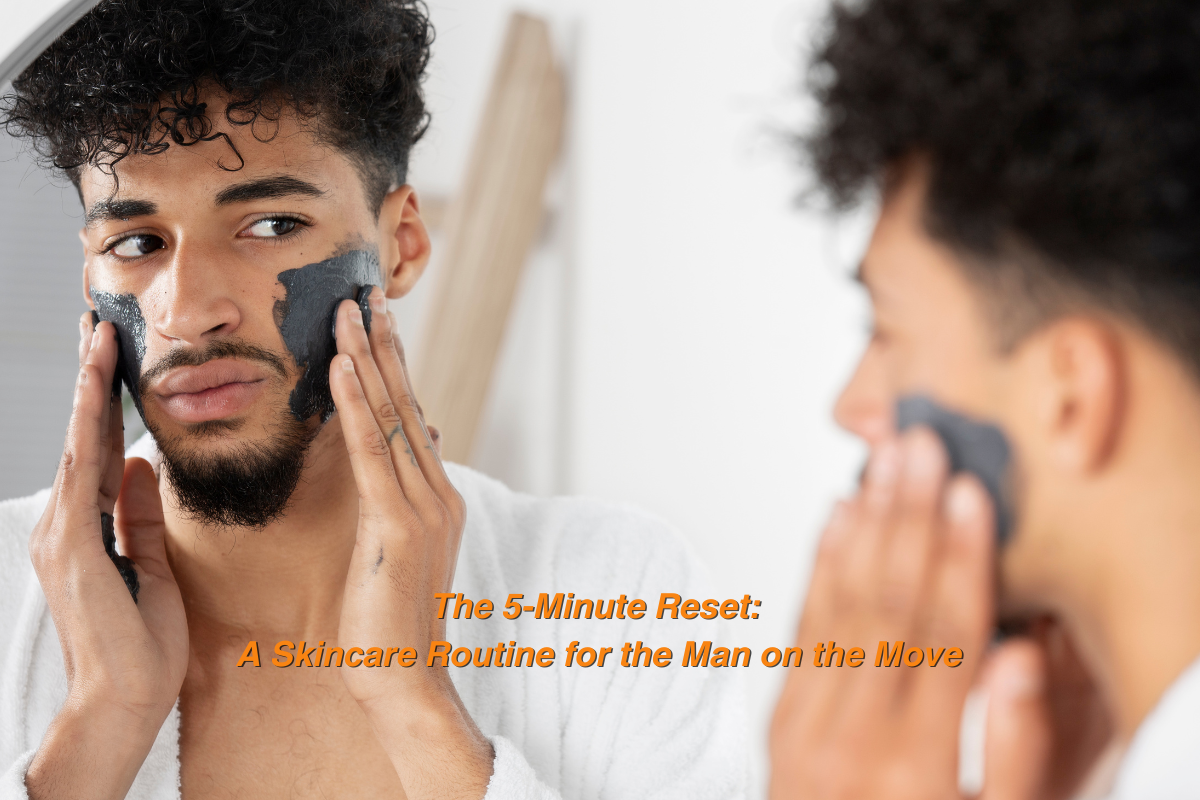 oung man applying a charcoal face mask while looking in the mirror, representing a quick and effective men’s skincare routine for busy lifestyles